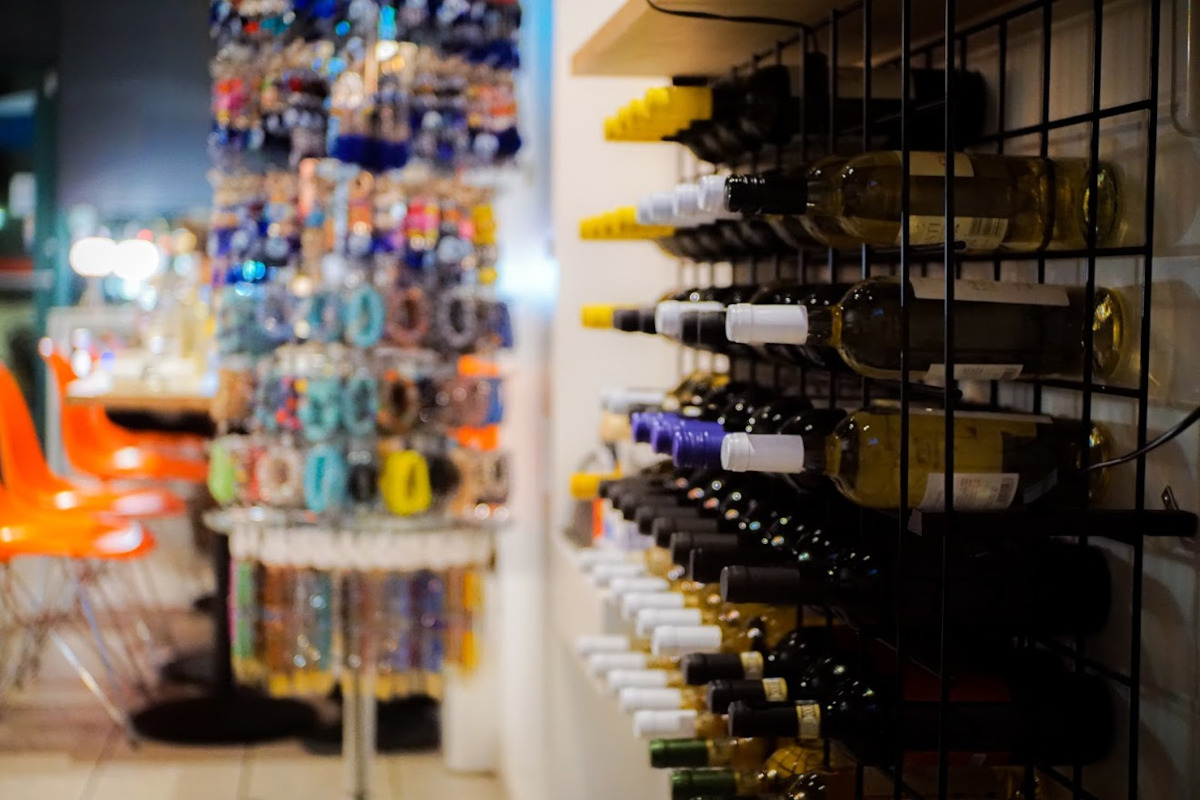 Interior, shelves with bottles of wine